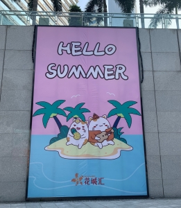 Sign says "hello summer