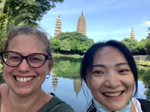 selfie in front of pagoda reflecting pond