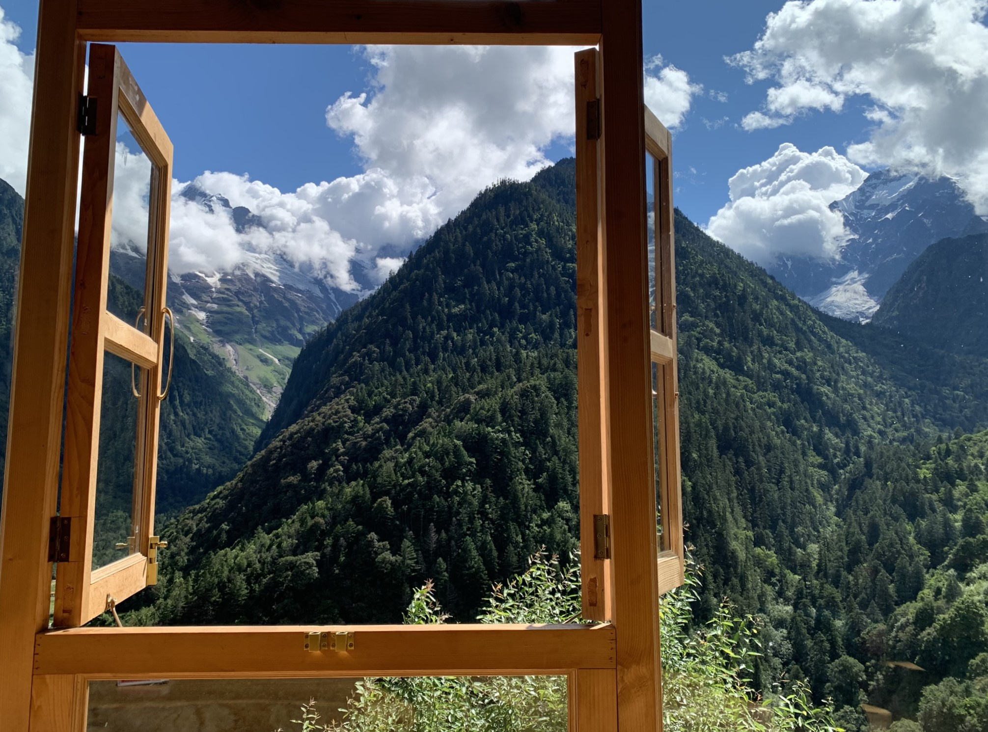 Open window with mountain view