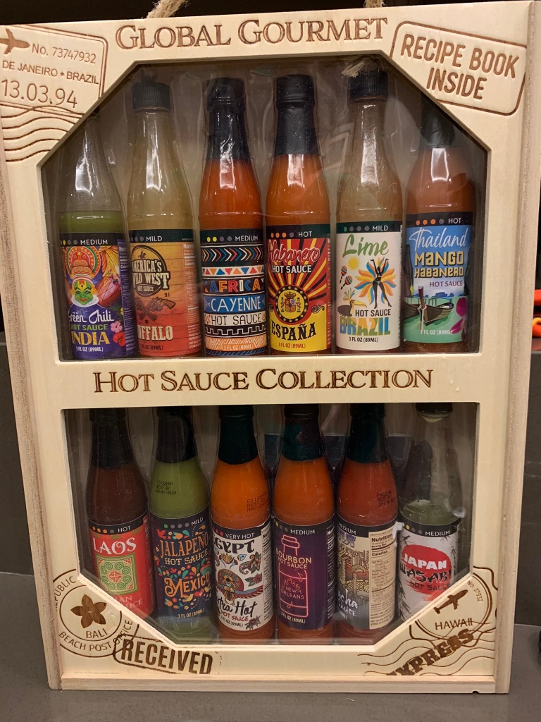 Boxed collection of a dozen hot sauces
