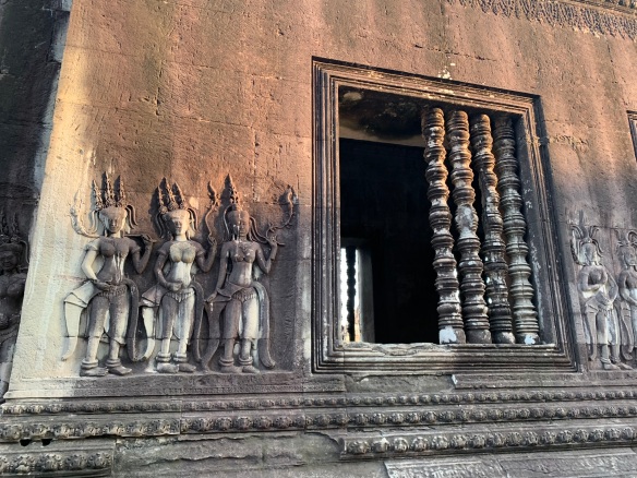 window and Hindu bas-relief carving