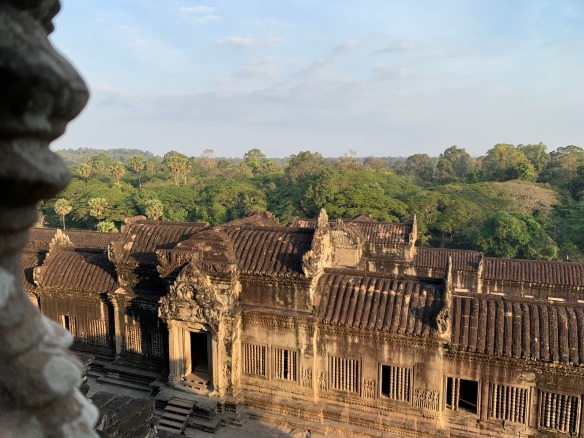view from the upper middle temples, over the side buildings/corridors of Angkor Wat