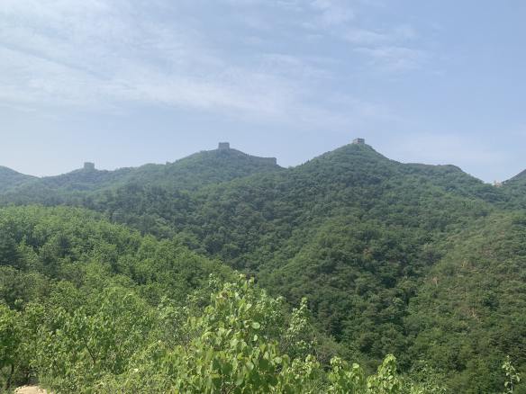 Not-too-distant mountain ridge topped with the Great Wall watchtowers